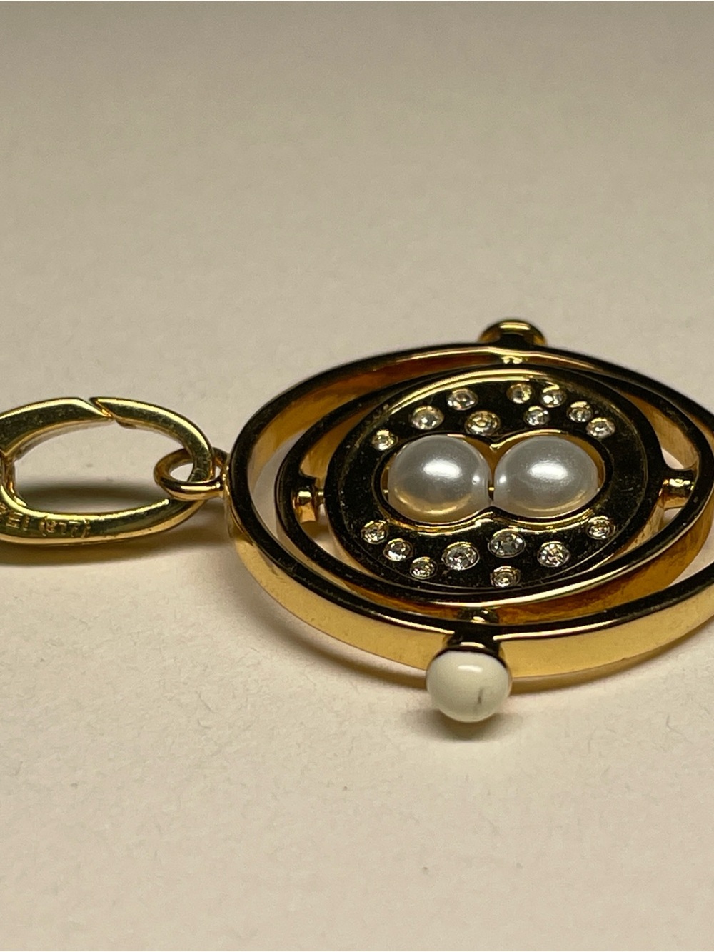 Harry Potter Gold Time Turner Pendant Charm with Pearl and Crystal Accents - Picture 2 of 4